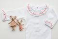 Witte body met rode detailboord