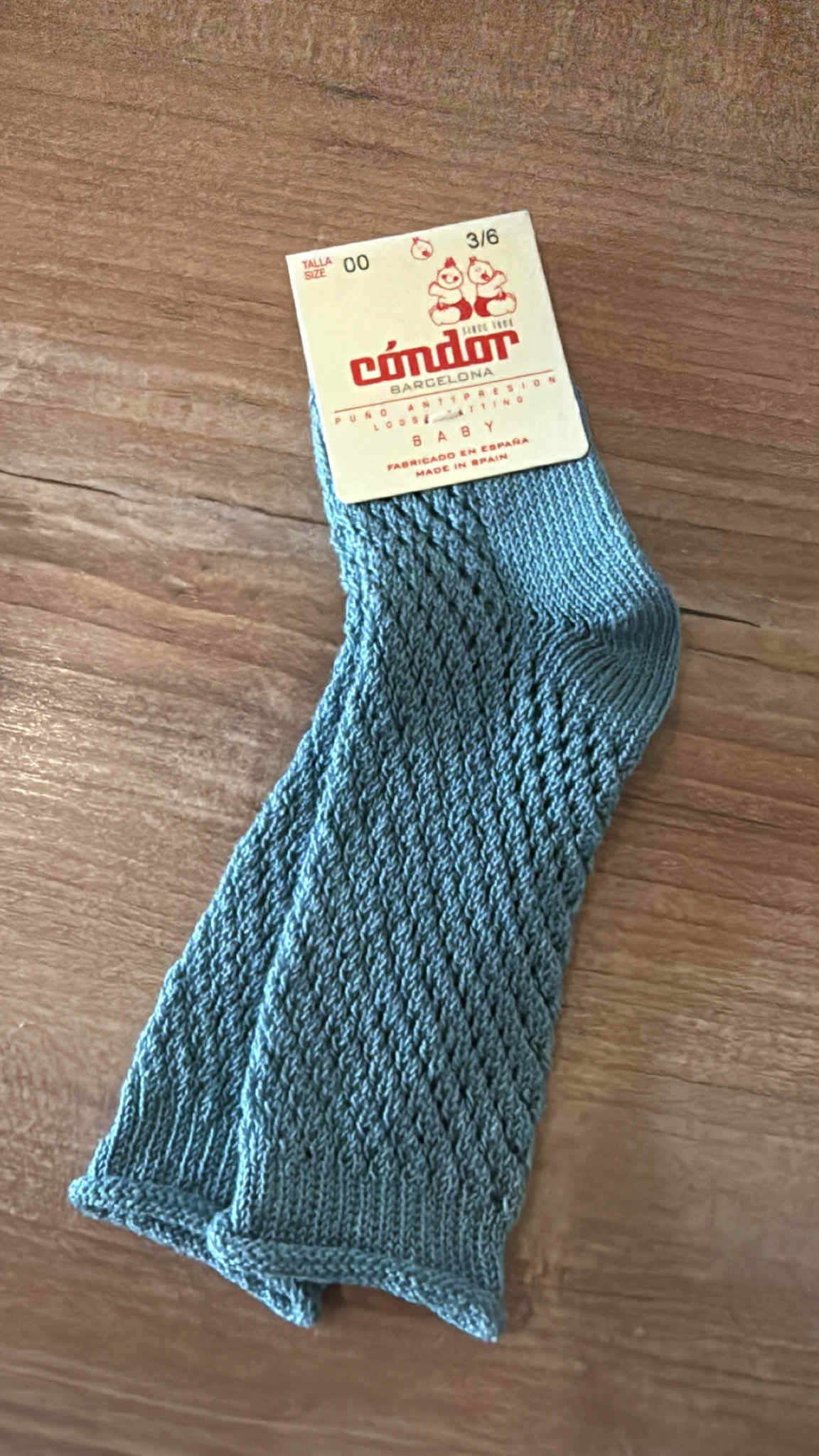 opengeweven kniekous azuurblauw