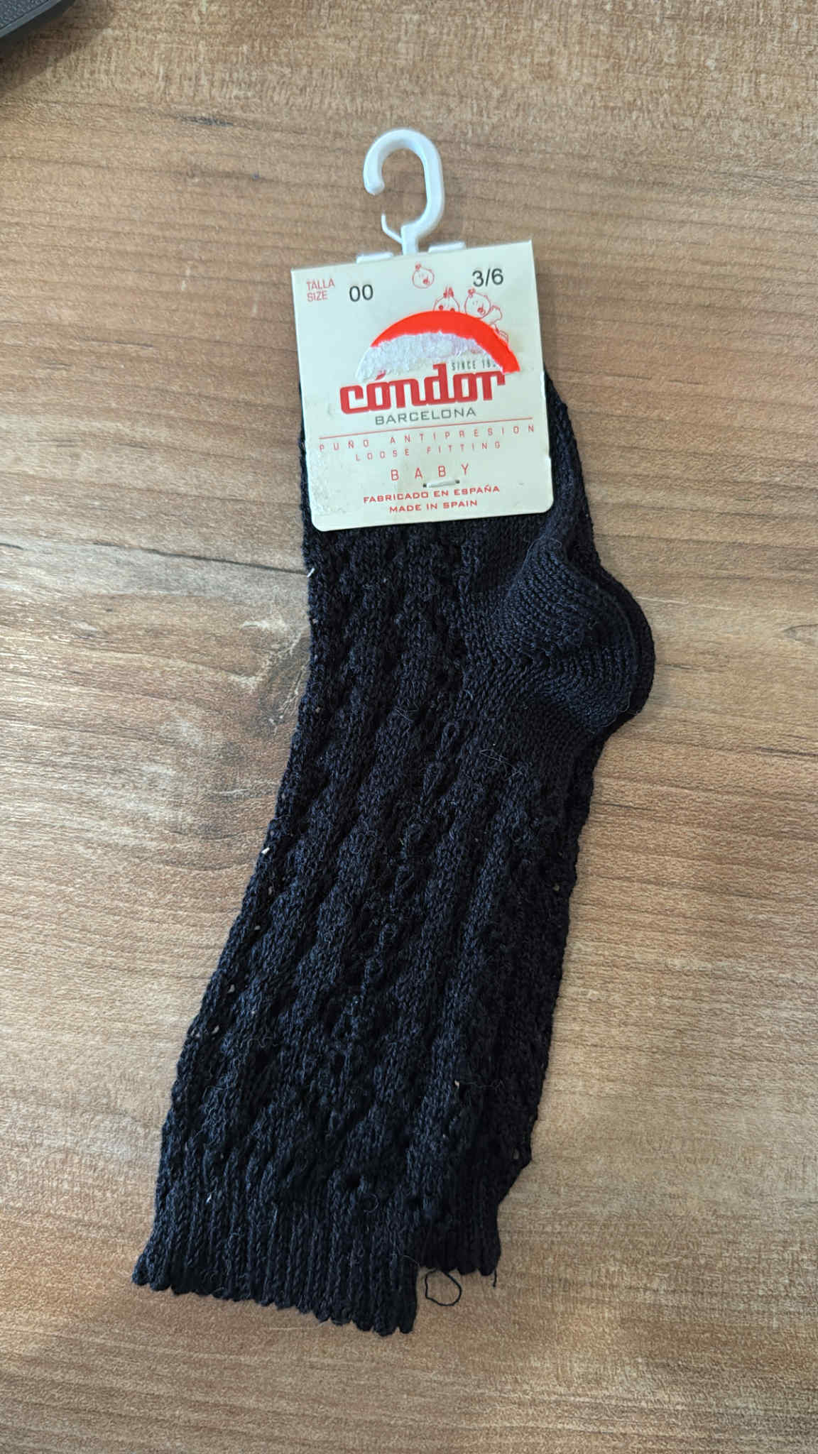 Opengeweven kniekous ZWART