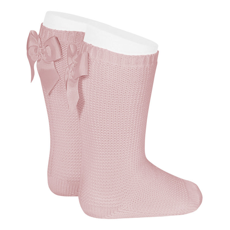 Licht gebreide kniekousjes met strik achteraan ROSA PALO